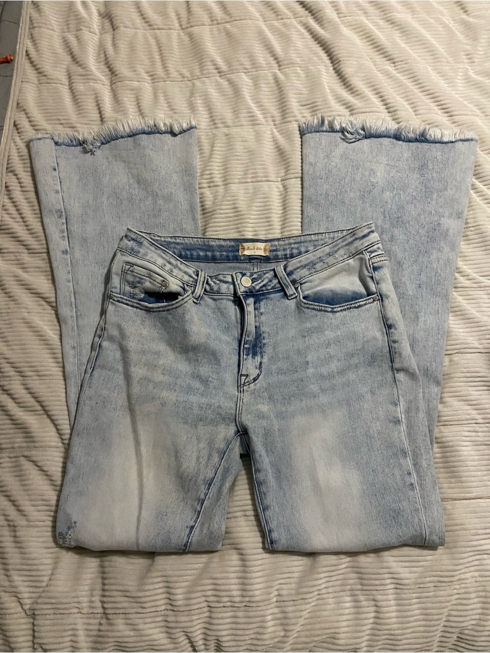 Altar'd State Light Blue Flare Jeans with Raw Hem